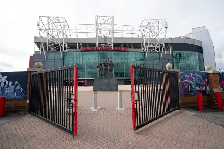 Empty sidewalks around Old Trafford, the home of Manchester United.