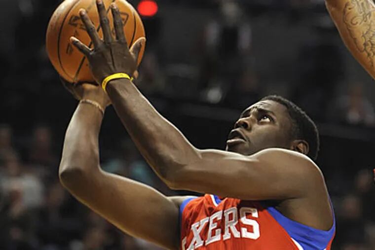 Jrue Holiday scored 13 points but also accounted for six of the Sixers' 20 turnovers. (Greg Wahl-Stephens/AP Photo)
