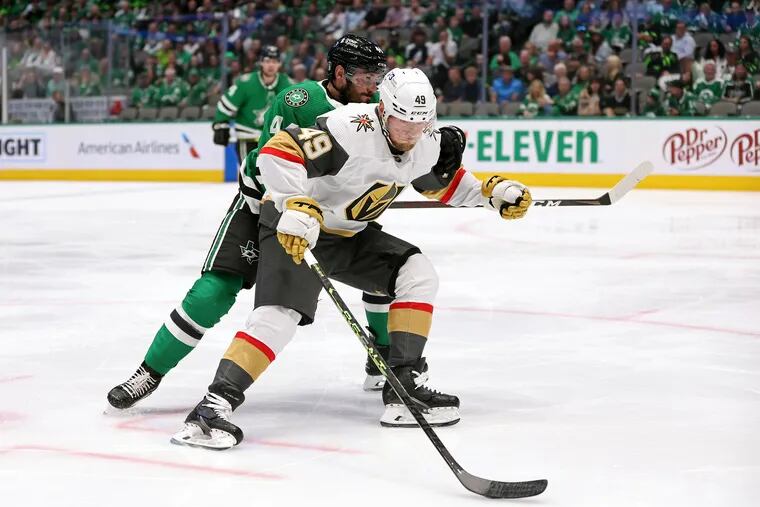 DALLAS, TEXAS - MAY 23:  Ivan Barbashev #49 of the Vegas Golden Knights battles for the puck with Joel Hanley #44 of the Dallas Stars during the second period in Game Three of the Western Conference Final of the 2023 Stanley Cup Playoffs at American Airlines Center on May 23, 2023 in Dallas, Texas. (Photo by Steph Chambers/Getty Images)