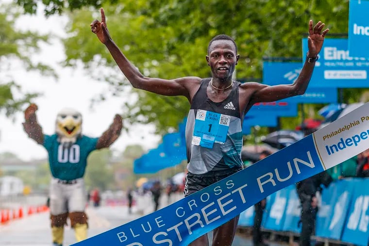 Daniel Kemoi, crosses the finish line as the men's winner in a time of 47:20 at the 2019 Broad Street Run on May 5, 2019.