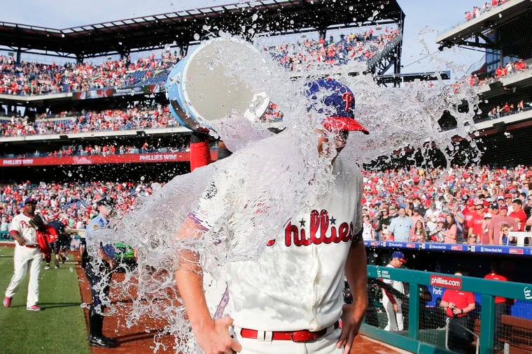 Phillies pitcher Nick Pivetta receives the sports drink bath after throwing a complete one run game beating the Cincinnati Reds 4-1 on Saturday, June 8, 2019 in Philadelphia.