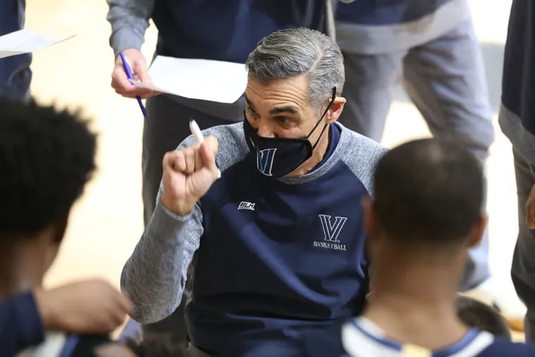 Jay Wright of talks to his team during a game against Marquette in February.