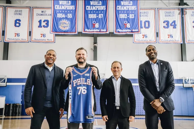 The Sixers introducing new president of basketball operations Daryl Morey (second from left).