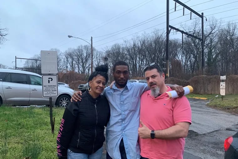 James Frazier, center, was freed from a life prison sentence April 4, 2019. The District Attorney's Office cited misconduct by fired homicide Detective Philip Nordo as the reason why the office did not retry Frazier after a judge vacated his sentence. With Frazier are is mother, Marva Gardner, and his attorney, Edward J. Foster.