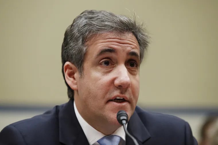Michael Cohen, President Donald Trump's former personal lawyer, testifies before the House Oversight and Reform Committee on Wednesday.