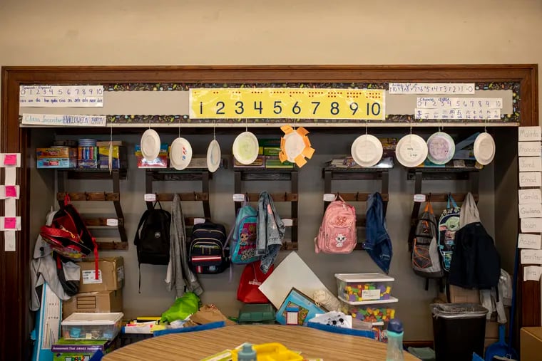 In this file photo, students' backpacks hang in a first-grade class at Vare-Washington Elementary School in Philadelphia. Some districts are mandating clear book bags as a safety precaution; Philadelphia is currently not considering changing its policy.