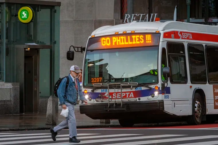 SEPTA bus with marquis that reads “Go Phillies!!!” at 15th and Market Streets on Wednesday, Oct. 18, 2023.