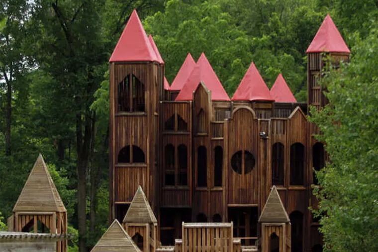 The Kids Castle in Doylestown - an eight-story wooden playground with distinctive spires towering overhead - is undergoing renovations, the first of what a local group of volunteers hopes is three phases to revamp the landmark. (David Swanson / Staff Photographer)