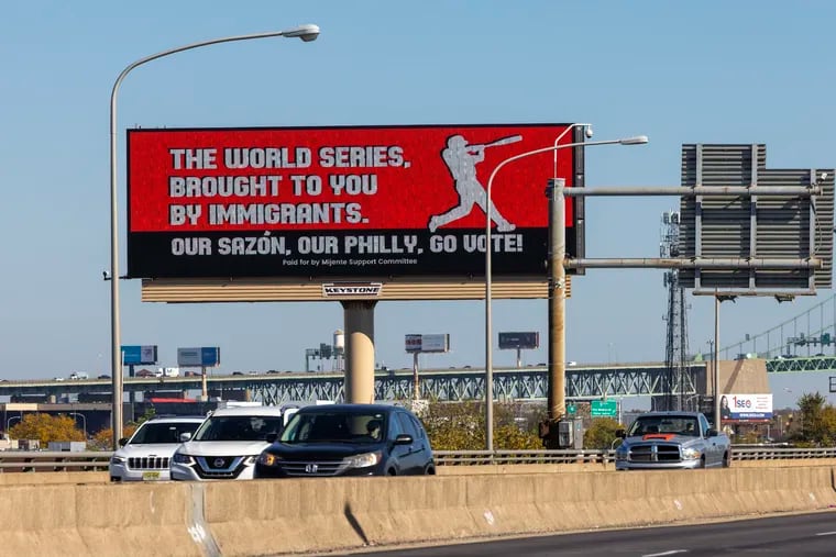 Motorists see this pro-immigrant World Series message on Interstate 95 as they pass by Citizens Bank Park. The electronic billboard went live on Wednesday, offering its message before the Phillies and Astros meet in Game Five tonight.
