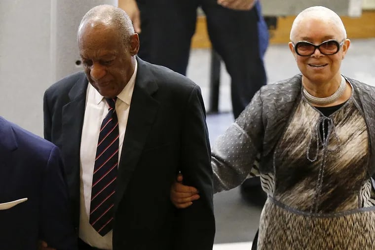 Bill Cosby, left, and wife Camille Cosby enter the Montgomery County Courthouse in Norristown, PA on June 12, 2017.