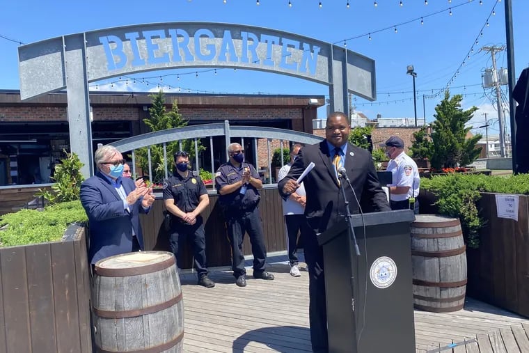 Standing in front of the Boardwalk Biergarten, Atlantic City Mayor Marty Small Sr. announces order legalizing open containers of alcohol on most of the Boardwalk and Gardner's Basin.