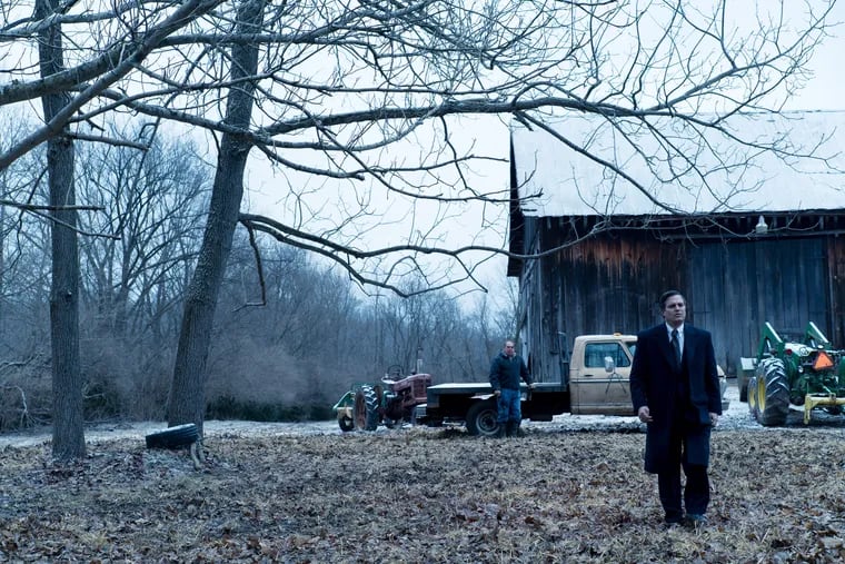 Bill Camp (left) as Wilbur Tennant, a cattle farmer whose cows are dying, and Mark Ruffalo (right) as environmental attorney Robert Bilott, star in director Todd Haynes' "Dark Waters," based on a true story.