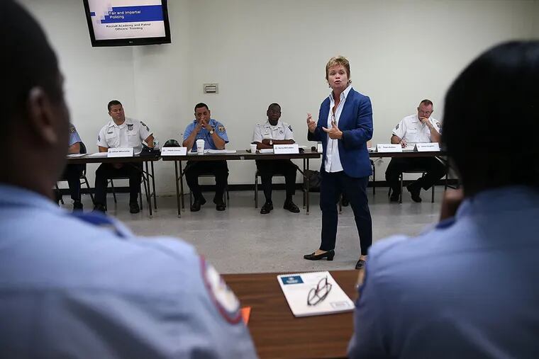 Mary Hoerig, an inspector with the Milwaukee Police Department, addresses Philadelphia police officers during a training session titled “Fair and Impartial Policing.” (DAVID MAIALETTI/Staff Photographer)