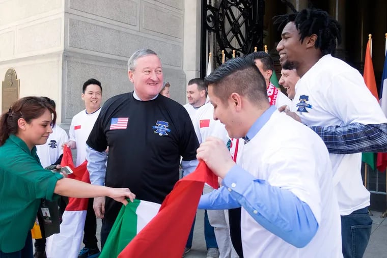 The tournament will culminate in a final game at Citizens Bank Park on Nov. 5. Mayor Kenney (center) — who said the idea came to him while watching the 2014 World Cup— talked up the tournament at City Hall on Friday.