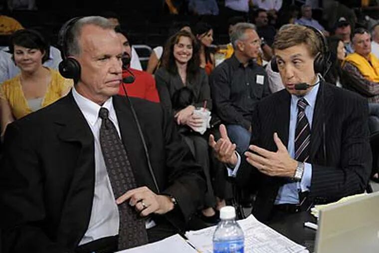 Doug Collins (left), who is currently working the Lakers-Rockets series as an analyst on TNT, coached eight seasons in the NBA. (Kevork Djansezian/AP file photo)