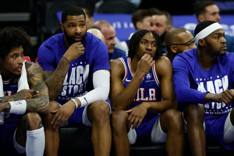 From left: Kelly Oubre Jr., Marcus Morris Sr., Tyrese Maxey and Paul Reed watch their loss to the Mavericks from the Sixers bench on Monday night.