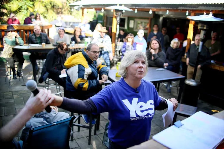 Karen Sherman of Yes California, leads a secessionist meeting at the Hole in the Wall bar in San Diego. "California is different from America," says Marcus Ruiz Evans, co-founder of Yes California. "California is hated. It's not liked. It's seen as weird."