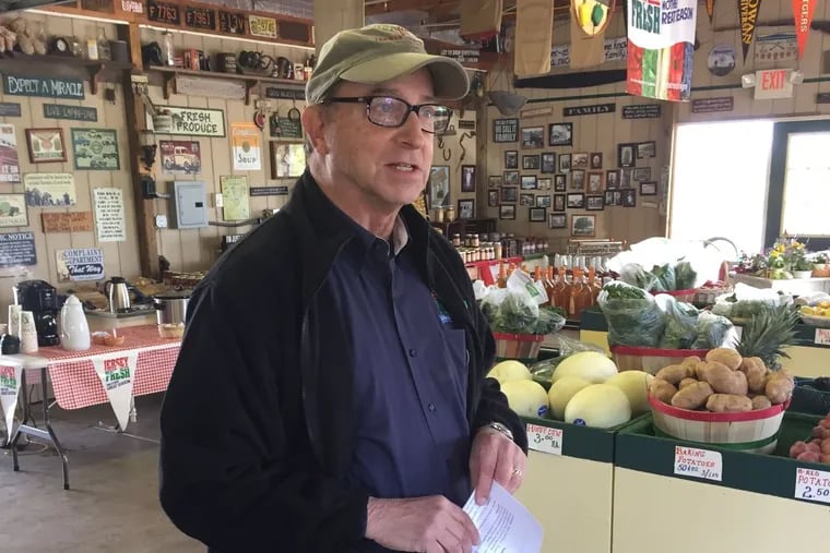 New Jersey Agriculture Secretary Douglas Fisher visits the Grasso Girls Farm Market in Mullica Hill to mark the start of the growing season for strawberries and asparagus.