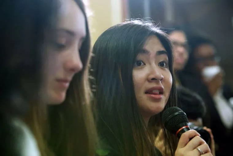 Central High School senior Christine Phan asks the candidates a question during the Student Voices Mayoral Forum. Although still in high school, many of the teens at Tuesday's forum will be of voting age in time for the May primary, or the general election in November. (STEPHANIE AARONSON / STAFF PHOTOGRAPHER)