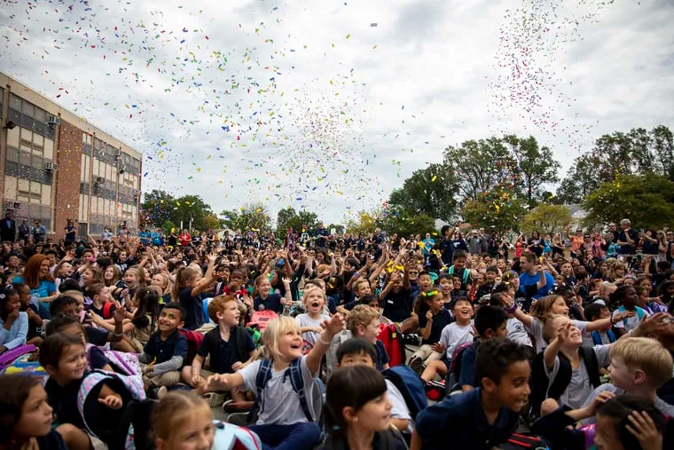 Students at Greenberg Elementary School celebrate for being awarded the U.S. Blue Ribbon for Excellence, the nation's top education prize. Twelve schools across the region, including two in Philadelphia, won the honor.