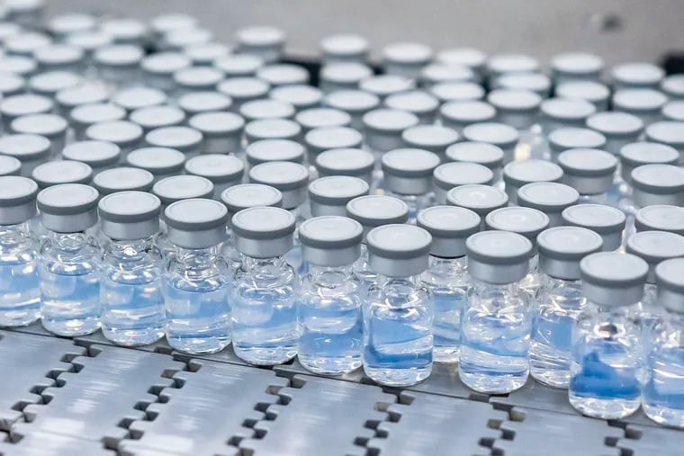 Vials of Pfizer's updated COVID-19 vaccine during production in Kalamazoo, Mich., in mid-August.