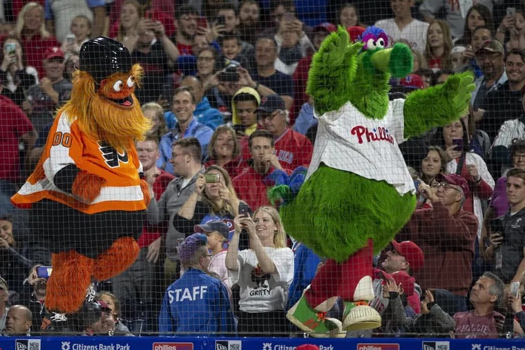 Gritty and the Philly Phanatic dance at Citizens Bank Park on Saturday.