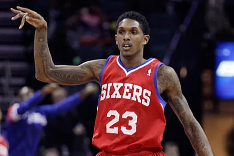 Lou Williams led the Sixers with 23 points against the Bobcats. (Chuck Burton/AP)