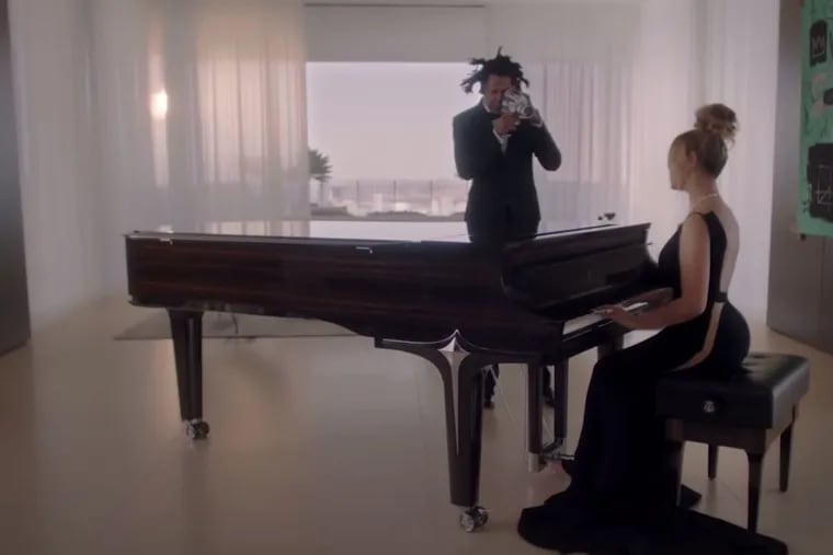 Beyonce playing Moon River and serenading Jay Z in "About Love." The commercial was released last Monday and it is a part of Tiffany's new ad campaign to reach younger consumers.