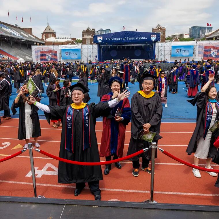 Graduates looking for family after the finish of the 2024 graduation for the University of Pennsylvania held at Franklin Field on Monday, May 20.