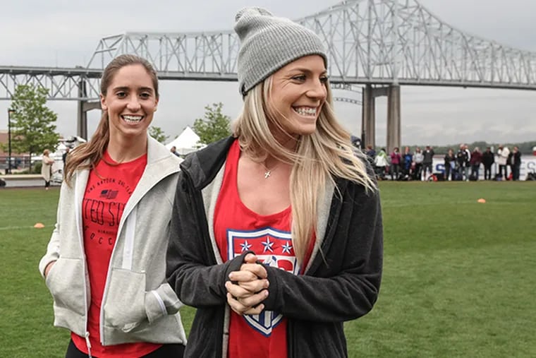 Soccer Stars Morgan Brian, left and Julie Johnston giving a clinic and taking Q and A for young soccer players at the Union practice fields adjacent to PPL Park in Chester, Pa., Thursday, May 21, 2015.  (Steven M. Falk / Staff Photographer)