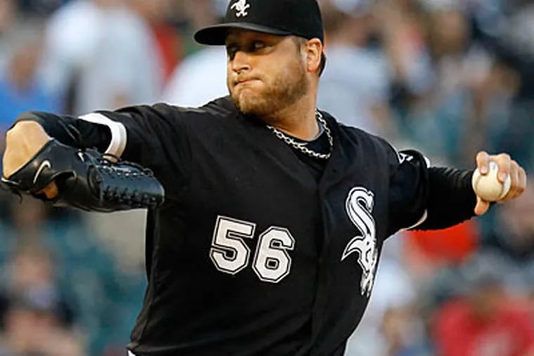 Mark Buehrle will be reunited with his old White Sox manager, Ozzie Guillen, in Miami. (AP)
