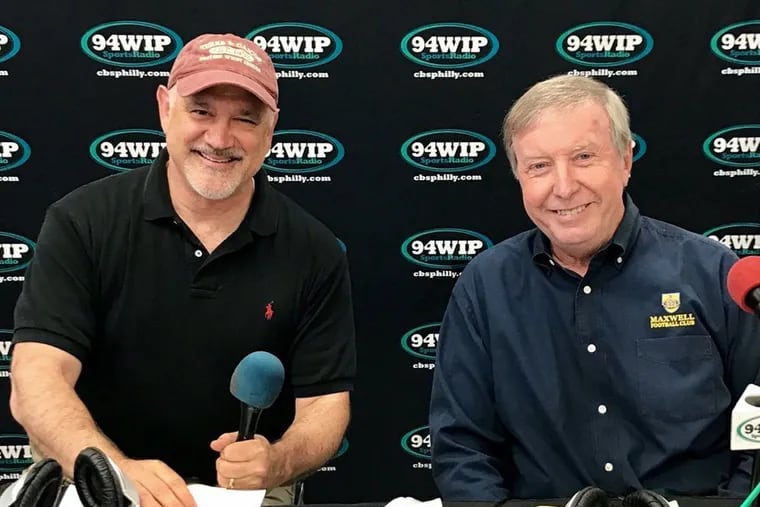 Longtime 94.1 WIP host Glen Macnow (left), seen here alongside his former cohost, Ray Didinger. Macnow is retiring after more than three decades at the station.
