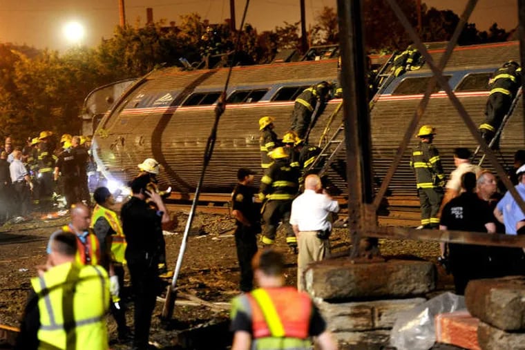 &quot;It was chaos,&quot; Eli Kulp recalls of the aftermath of the crash in Port Richmond on May 12. His neck was slammed into a luggage rack and he was left under debris, unable to move. (Tom Gralish / Staff Photographer)