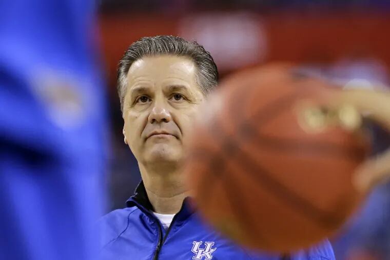 Kentucky coach John Calipari watches practice on the day before the Final Four. (Associated Press)