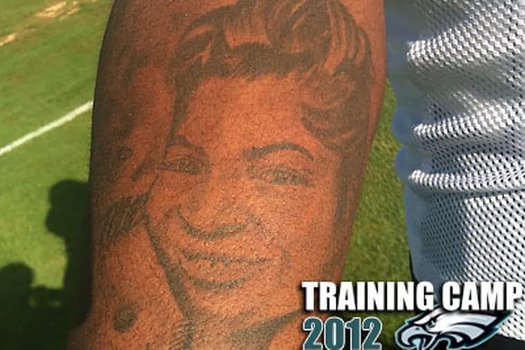 Vinny Curry said that he talks to this tattoo of his mother when he needs soothing. (Jeff McLane/Staff)