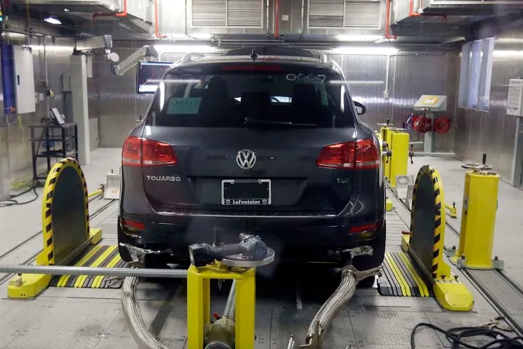 A Volkswagen Touareg diesel is tested in the Environmental Protection Agency's cold-temperature test facility. The automaker disclosed additional suspect software that could potentially help exhaust systems run cleaner when tested. (AP Photo/Carlos Osorio)