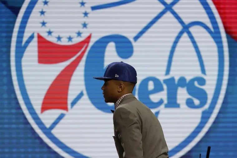 Markelle Fultz walks off the stage after being selected first overall by the Philadelphia 76ers during the 2017 NBA Draft at the Barclays Center in Brooklyn.