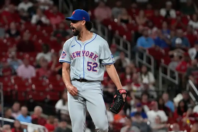 New York Mets relief pitcher Jorge Lopez reacts after striking out St. Louis Cardinals' Paul Goldschmidt with the bases loaded to end the seventh inning of a baseball game Tuesday, May 7, 2024, in St. Louis.