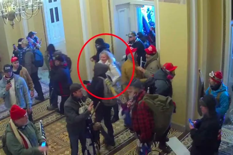 A woman FBI agents have identified as Kelly McFadden O'Brien is seen entering the Capitol building in this still from Jan. 6 security footage included in court filings.