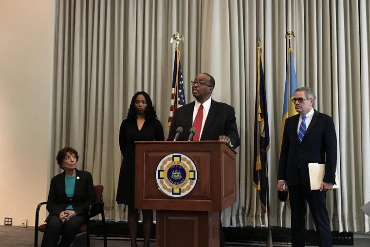 Robert Listenbee, center, was appointed first assistant district attorney by Larry Krasner on Feb. 28, 2018