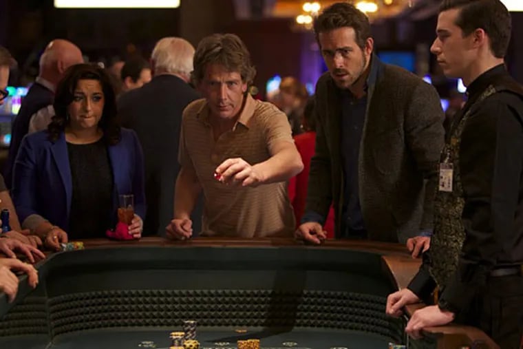 Ryan Reynolds, right, and Ben Mendelsohn in a scene from "Mississippi Grind." (Patti Perret/A24)