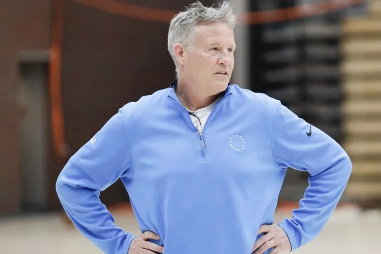 Sixers coach Brett Brown waits to meet with the media before a team practice at Harvard University on Tuesday.