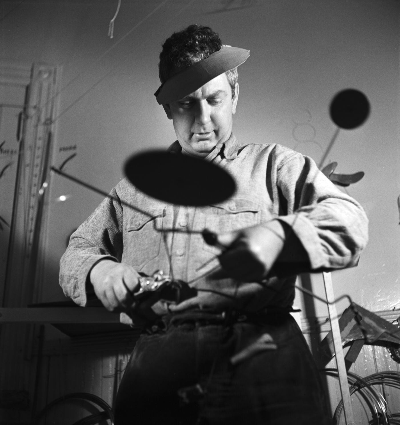 Alexander Calder in his New York City storefront studio, 1936.