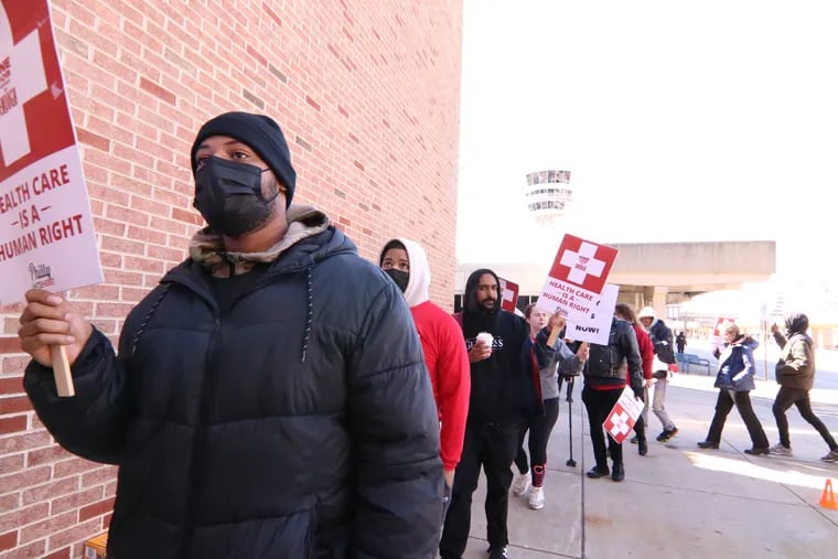 OTG employees with Unite Here Local 274 and their supporters picketed at the Philadelphia International Airport in February. Workers at the 15 Philadelphia International Airport restaurants operated by OTG ratified a new contract on Mon., Nov. 20, 2023.