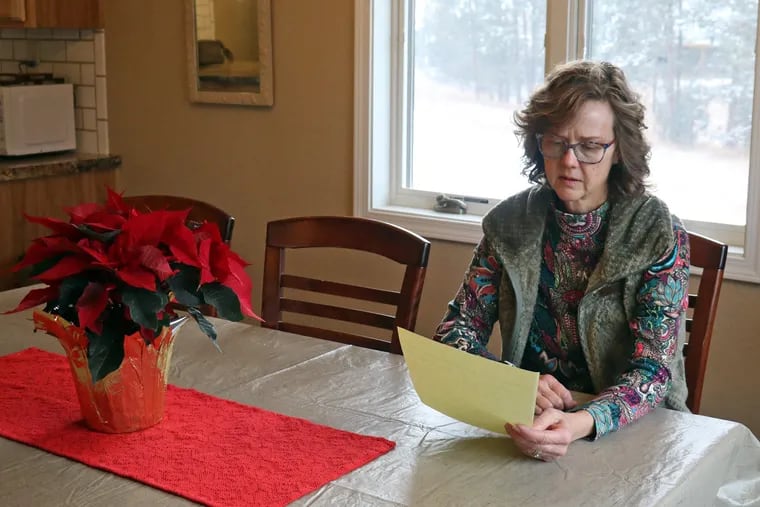 While recently sitting in the dining room of her South Dakota home, Lynette Reid reads over a letter she received from a then-teenage Andrew Bellatti in 2010, after he was charged with vehiclular manslaughter in an accident that killed Reid’s husband.