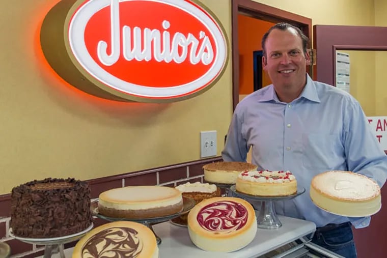 Say cheese: Owner Alan Rosen at the new Junior’s. (BRYAN WOOLSTON/For the Inquirer)
