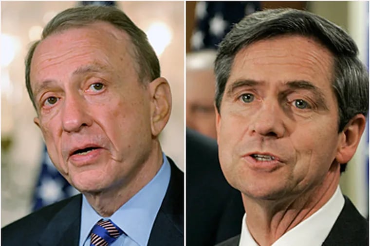 With the hours slipping away until the polls open Tuesday, Sen. Arlen Specter (left) finds himself in a tight race with Rep. Joe Sestak. (File photos)