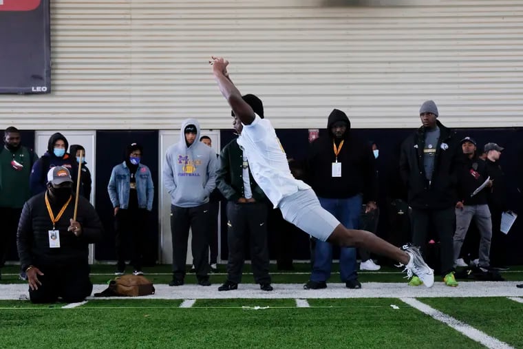 Texas Southern running back Jeff Proctor does a long jump at the NFL HBCU Combine at the University of South Alabama in Mobile, Ala. on Saturday, Jan. 29, 2022. (Dan Anderson/AP Images for NFL)