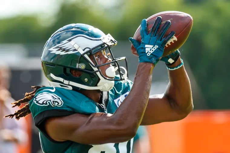 Philadelphia Eagle wide receiver #80, Markus Wheaton, watches the ball inot his hands during a drill at Eagles training camp at the NovaCare Center on August 2, 2018. MICHAEL BRYANT / Staff Photographer