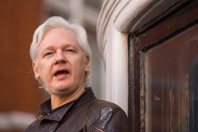 Julian Assange speaks May 19, 2017, from the balcony of the Ecuadorian embassy in London.
